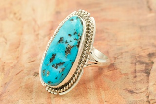 Genuine Sleeping Beauty Turquoise set in Sterling Silver. Created by Navajo Artist Kathy Yazzie. Signed by the artist. The Sleeping Beauty Turquoise mine is located in Gila County, Arizona.
